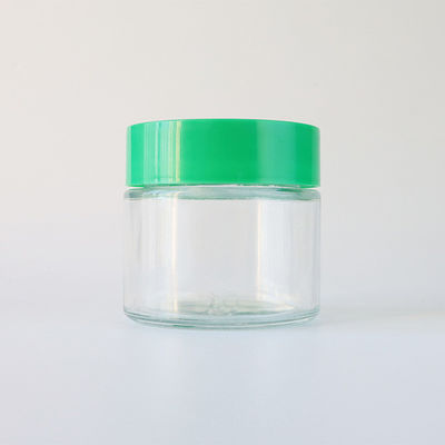 滑らかな丸いガラス 雑草の花のキャンディ 貯蔵容器 子供に耐えるスクリューキャップ